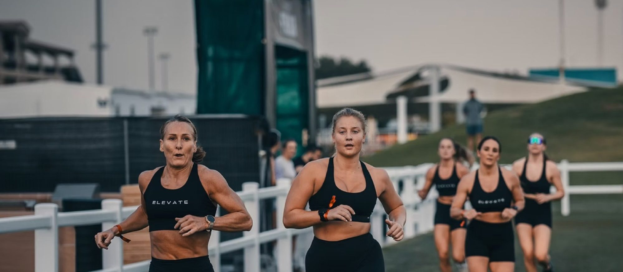 A group of colleagues running the loop together at a Primal race