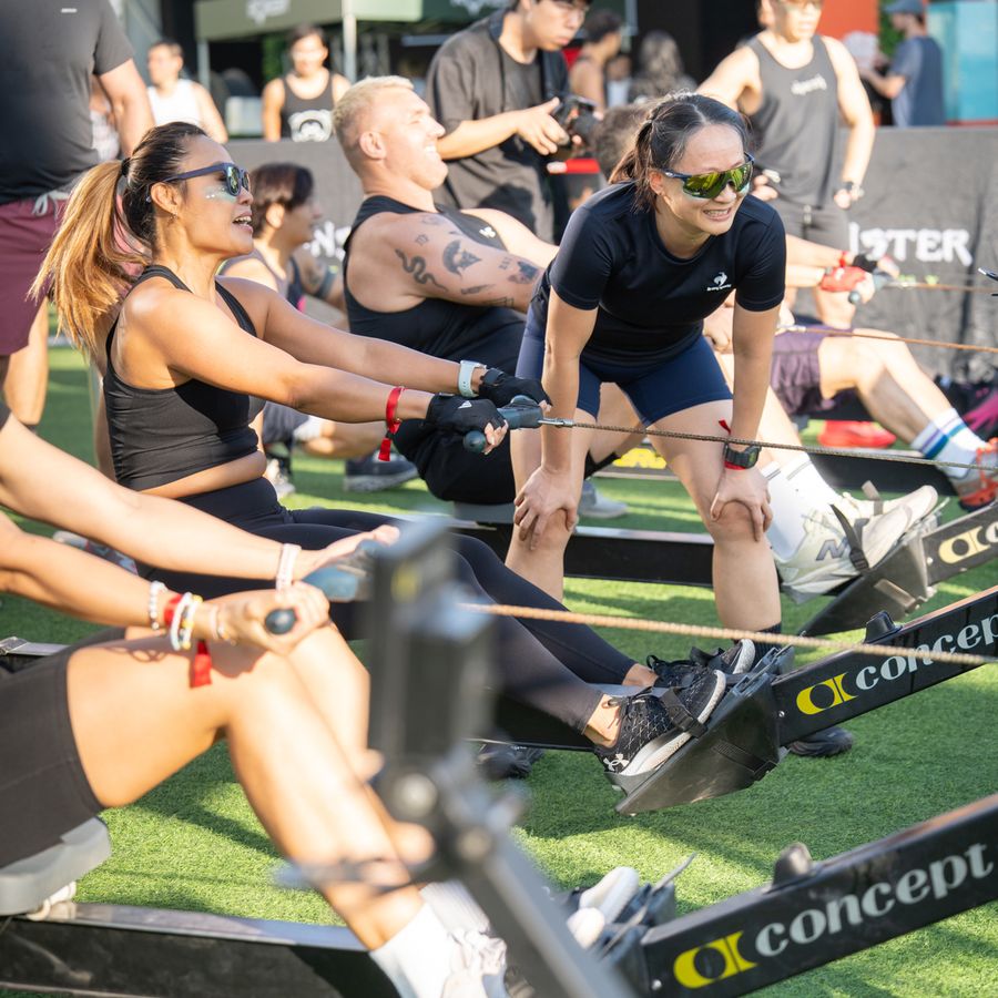A row of athletes working through a station together