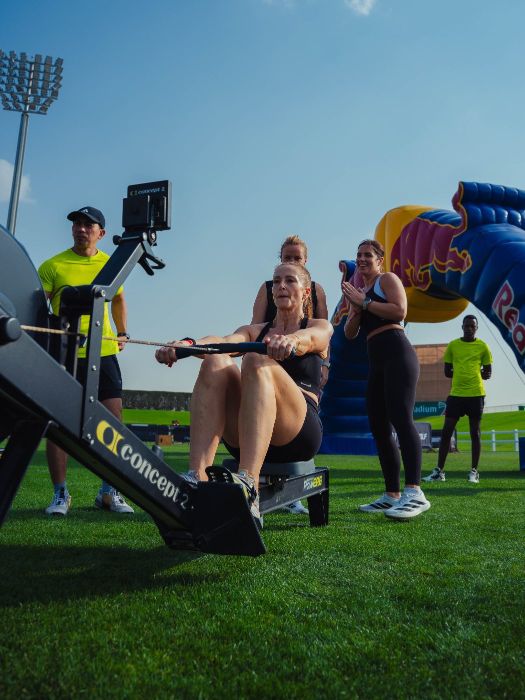 An athlete on the row with the crowd behind at a Primal race